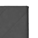 Detalle de las costuras diagonales del cabecero LLEVANT en gris oscuro