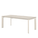 Mesa LISA 140, en travertino con pata beige, vista trasera en perspectiva