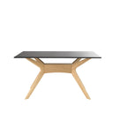 Mesa ELOISE de 140 cm, en negro con patas de roble, vista en perspectiva