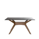 Mesa ELOISE de 160 cm, en negro con patas de nogal, vista trasera en perspectiva