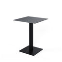 Mesa SAMIRA alta de 96 cm, en gris con pata negra, vista en perspectiva