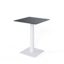 Mesa SAMIRA alta de 96 cm, en negro con pata blanca, vista en perspectiva