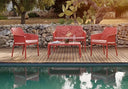 Sofá Net Bench y sillones Net Relax en coral junto a la piscina – Nardi