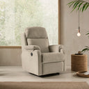 Sillón relax elevador JUPITER de respaldo alto, en beige, en un salón junto al ventanal