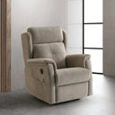 Sillón relax SIRIO, en beige, en un salón de suelo de microcemento