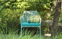 Cojín para sillón Net Relax sobre sillón en salice, en un jardín – Nardi