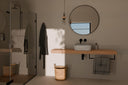 Espejo redondo PADUA de 90 cm con marco de aluminio, en negro, en un baño