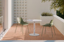 Mesa LYA Redonda Ø 70 Porcelánica, baja, blanco, blanca, en una terraza