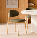 Silla WANDA, en verde, en un comedor